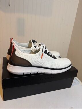 Cole Haan Zero Grand White Knit Sneakers with Black Panels and Orange Accents